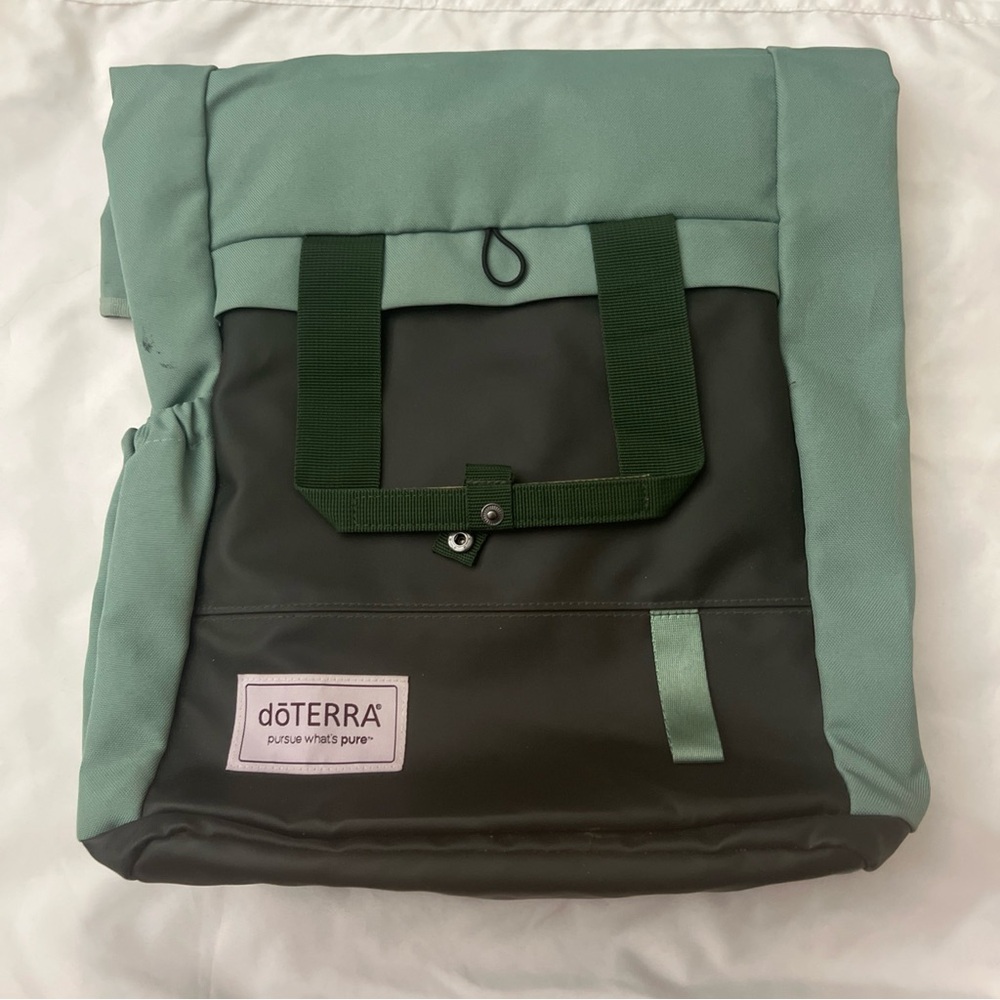 doTERRA Green and Black Backpacks with Minimalist Design